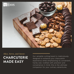 A John Boos Boos Block CCB Series Large Reversible Wood Chopping Board showcasing a variety of snack items including cookies, chocolate, nuts, and chocolate-covered treats. The text emphasizes the board's enhancement of the charcuterie experience. Perfect for any gathering, this Wooden Chopping Block brings both style and functionality with its 2.25-inch thickness and Maple construction.