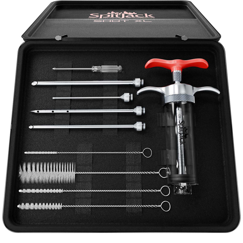 A SpitJack SHOT XL Meat Injector Kit featuring a meat syringe with ergonomic design, various attachments, brushes, and tools, all organized in a black case.