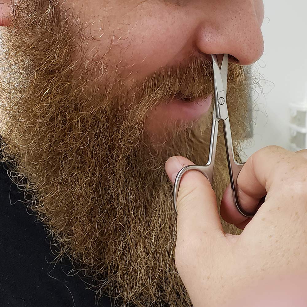 A hand uses SpitJack Utility Mini Scissors (4 Inch Stainless Steel) 2 Pack to trim the mustache of a bearded person.