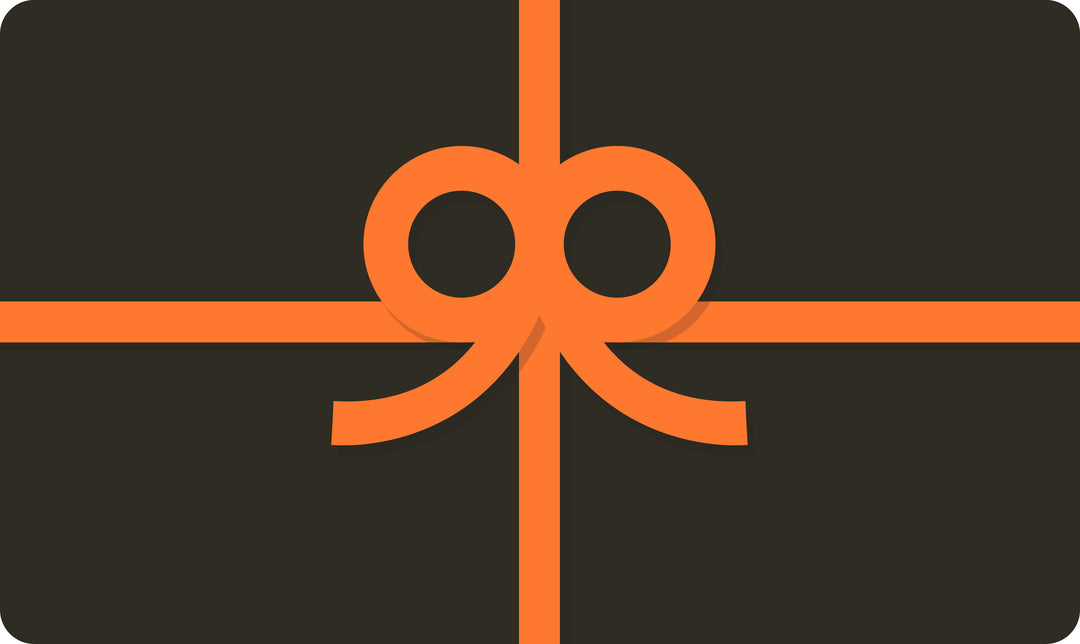 A dark gift box adorned with an orange ribbon and bow exudes elegance. Enhance the gift with a SpitJack Gift Card for an ideal present, featuring no processing fees for a seamless and stylish experience.