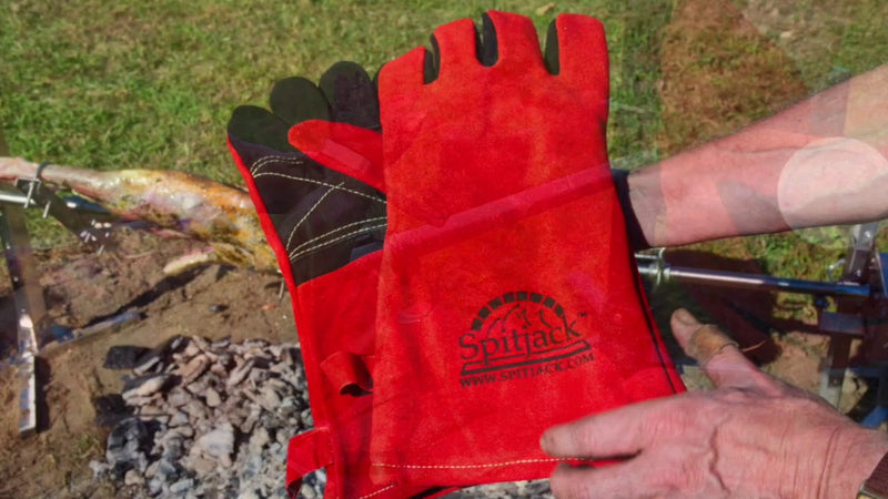 A pair of SpitJack Deluxe Fireplace - Barbecue Gloves FP, red leather welding gloves.