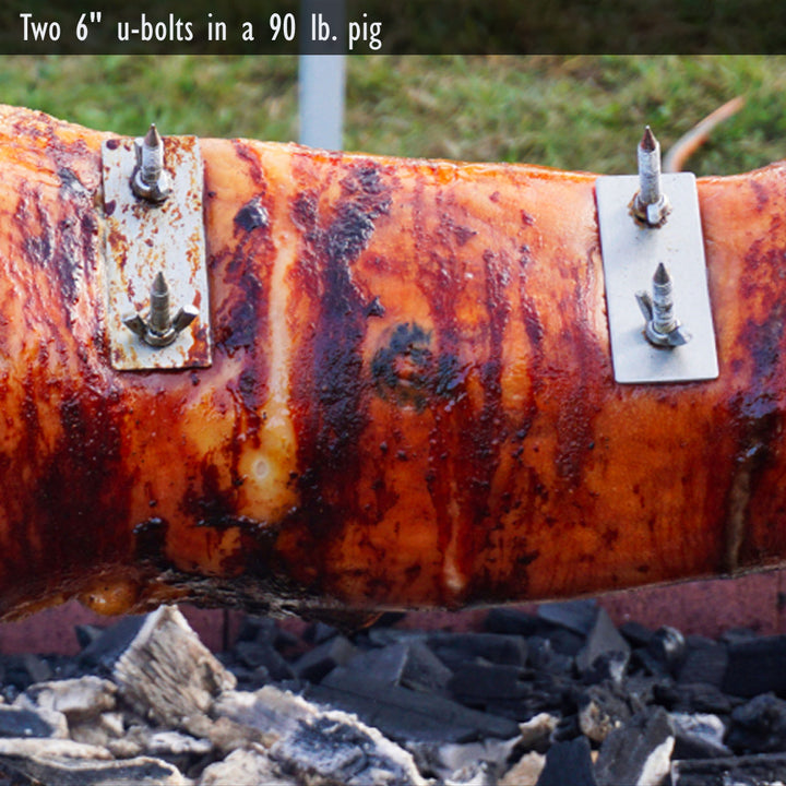 A large piece of meat is being cooked on a SpitJack Stainless Rotisserie Trussing U-Bolt - 6" - 2 Pack.