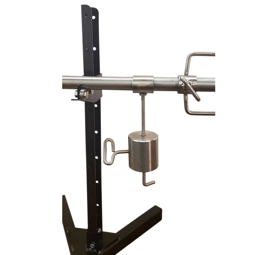 A SpitJack XB125C Whole Hog and Pig Spit Roast Rotisserie System with a bar attached to it.